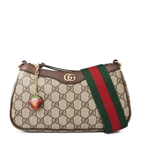 gucci pochette black|Gucci bag with strawberry charm.